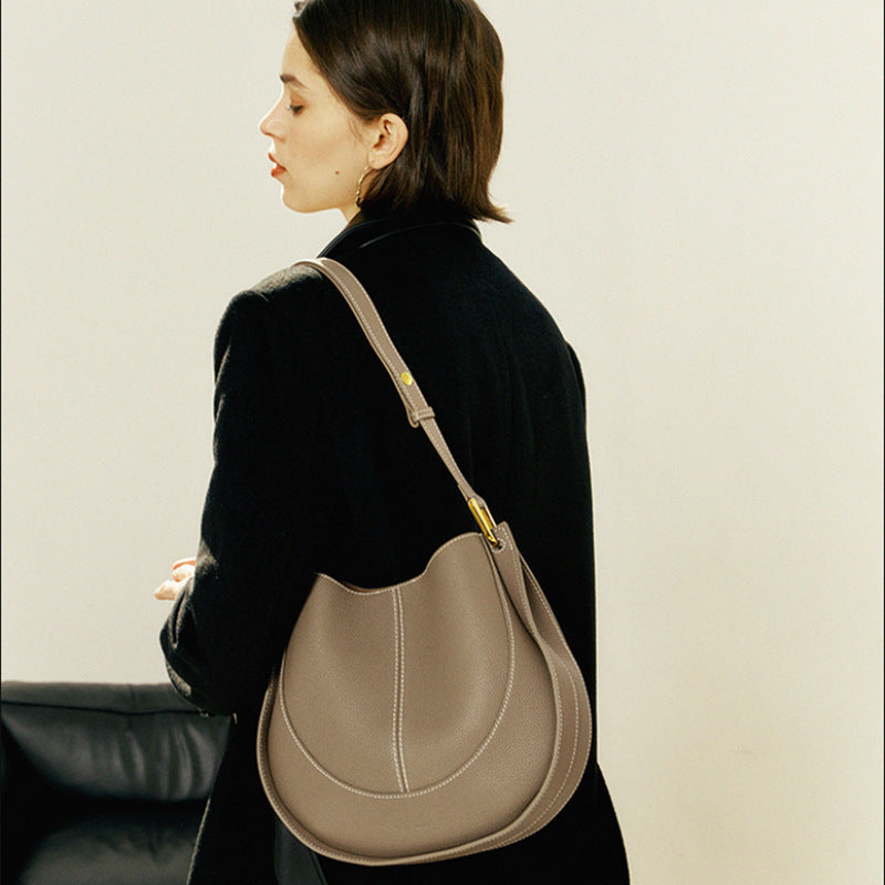 New 2024 First Layer Cowhide Messenger Bag Niche Light Luxury Women's Bag Design Single Shoulder Saddle Bag Leather Bag Women's Bag